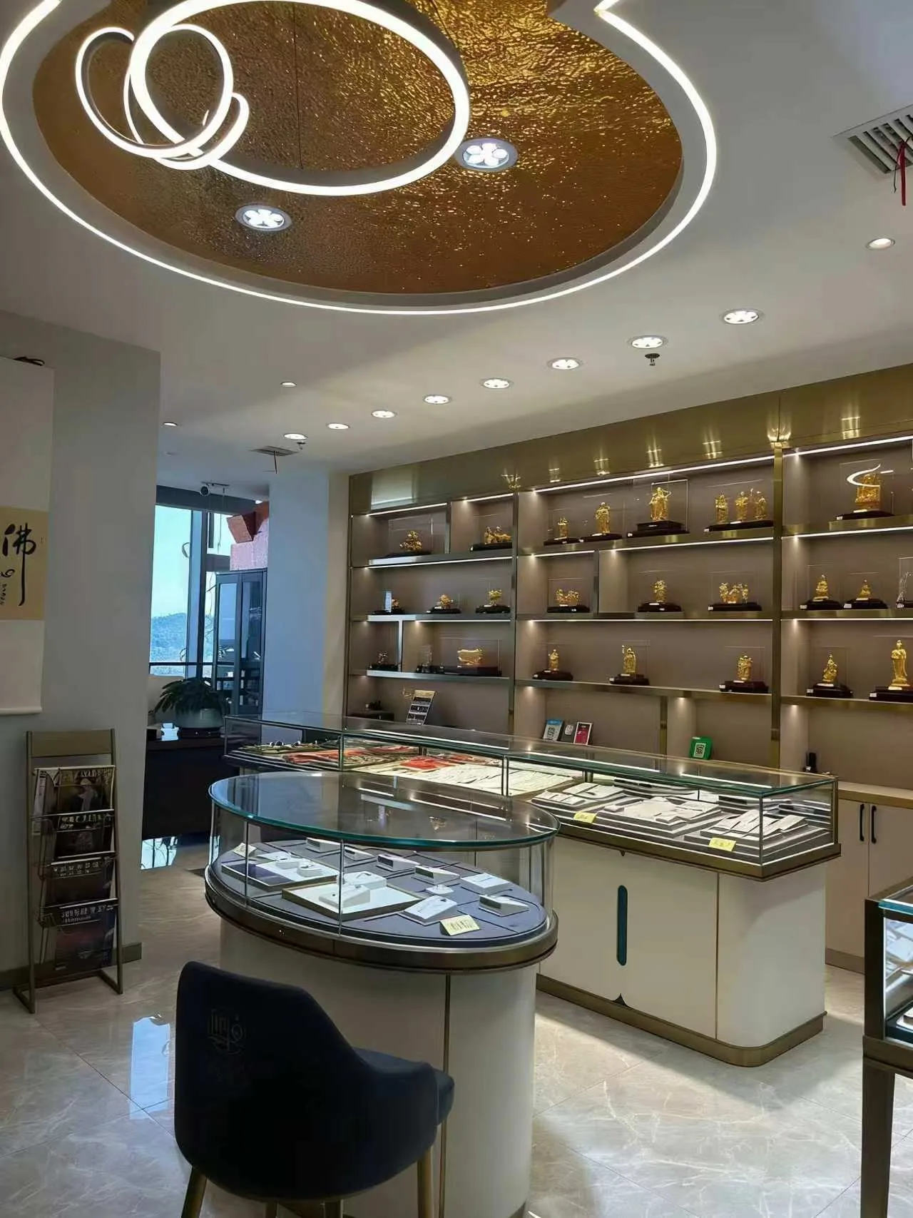 Curved jewelry counter and wall showcase in a retail store